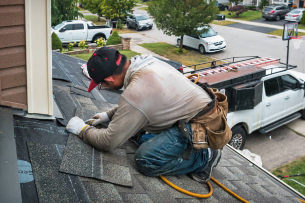 Professional Roof Replacement technician working in Hillsboro, IN